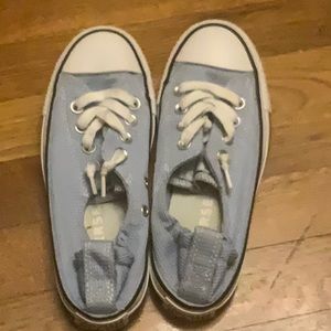 Just like new, very comfortable.  Elastic at heel makes the shoe comfortable